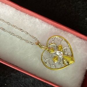 Heart shaped cross necklace